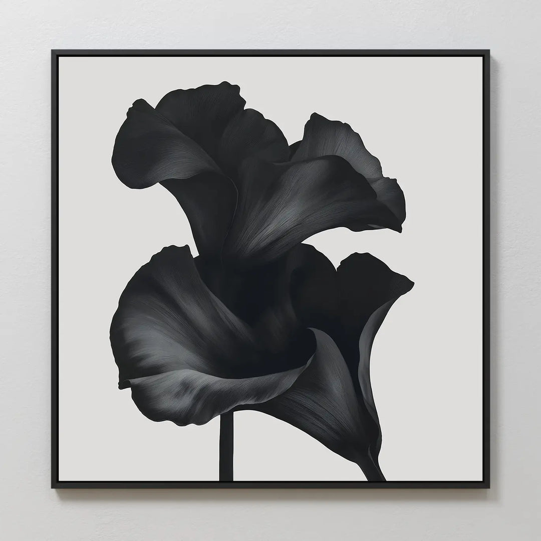 The Noir Bloom Canvas Art - Square showcases two large black calla lilies with elegant petals on a light background, ideal as minimalist wall art or for modern living room decor.