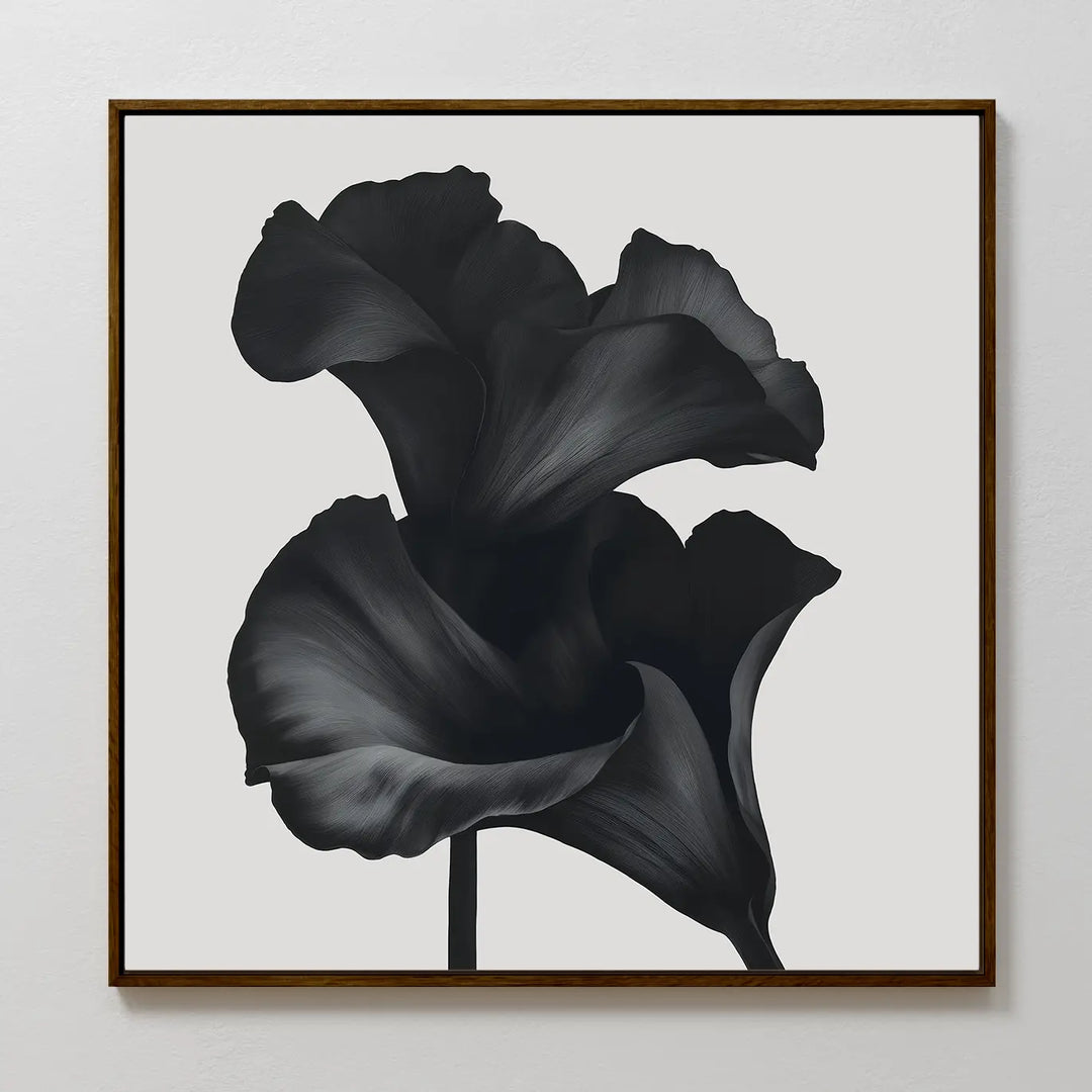 The Noir Bloom Canvas Art - Square features a framed black and white illustration of two calla lilies with detailed petals on a light background, creating striking minimalist wall art ideal for modern living room decor.