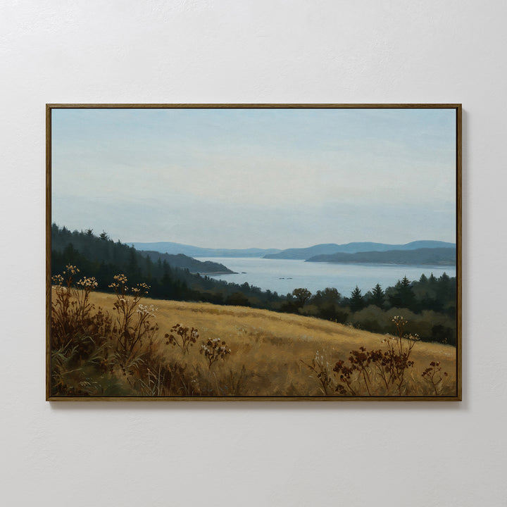 Northern Silence Canvas Art: a framed painting of coastal landscapes with grassy fields, wildflowers, evergreens, and distant blue hills—ideal minimalist wall art for your living room decor.
