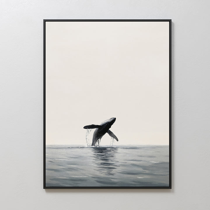 The Ocean Leap Canvas Art showcases a breaching whale with splashing water in minimalist, muted tones. This large framed piece adds a serene, modern vibe against any plain, light-colored wall.