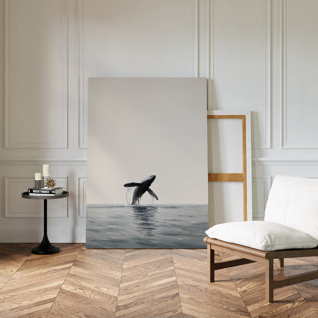 A modern room with parquet flooring, a cushioned wooden chair, a small round table with candles, and striking Ocean Leap Canvas Art. White paneled walls complete the serene space with this tasteful minimalist wall art.