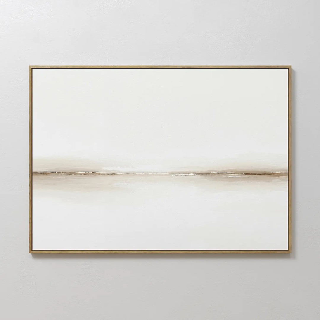 Pale Desert Canvas Art features a soft, horizontal beige and brown line on a white background in a slim gold frame—perfect for elevating your living room decor against a light gray wall.