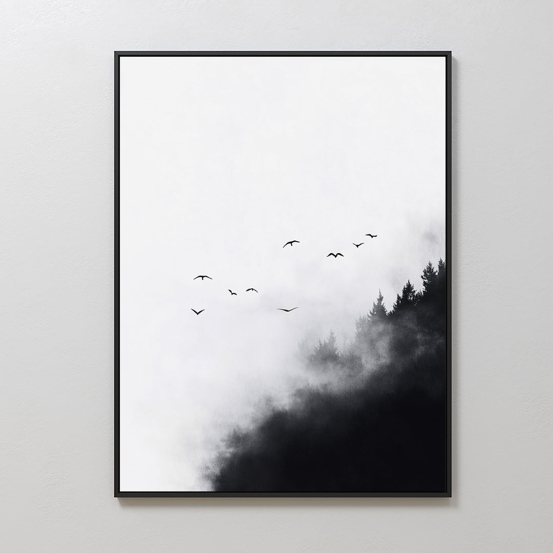 Passing Pines Canvas Art features a minimalist black-and-white forest with dark trees, mist, and soaring birds, framed in a simple black border. It creates a stunning contrast on any white wall.