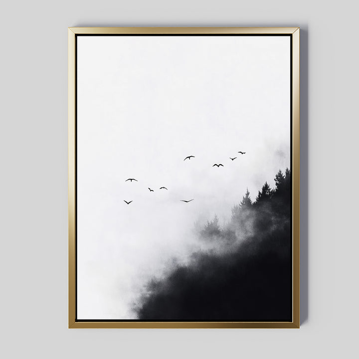Passing Pines Canvas Art: Minimalist wall art of a dark forest with tree silhouettes in mist on white background, a flock of birds above, and an elegant gold frame—perfect large wall décor for any space.