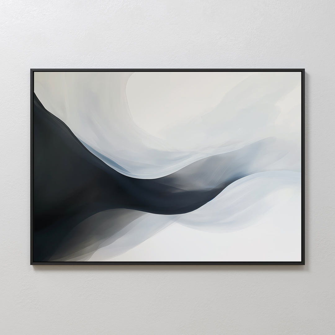 The Rippling Vista Abstract Canvas Art features flowing curves in black, gray, and white for a modern, elegant look. Framed in black, this minimalist wall art adds serene style when displayed on a light-colored wall.