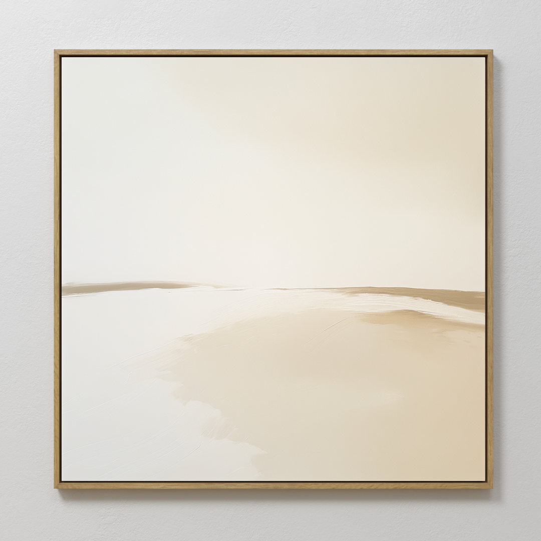 The Serene Expanse Abstract Canvas Art by My Store showcases beige and off-white abstract shapes, framed in light wood. This modern square wall art brings a calming, minimalist touch to any living room décor.