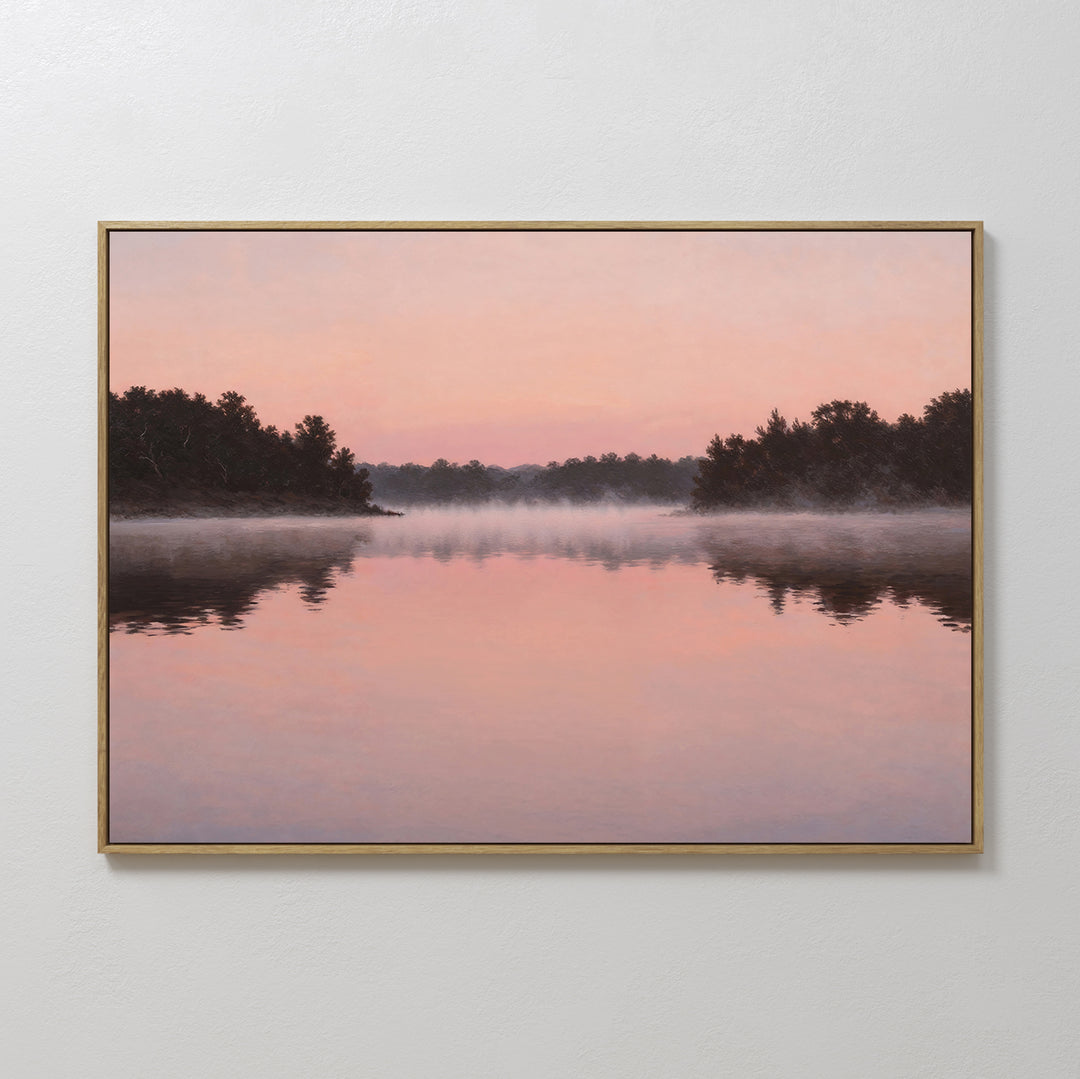 The Rose Lake Canvas Art features a serene sunrise with mist above calm water and soft pink skies. Minimalist bedroom decor, showcasing trees’ silhouettes mirrored in the tranquil lake for a peaceful ambiance.