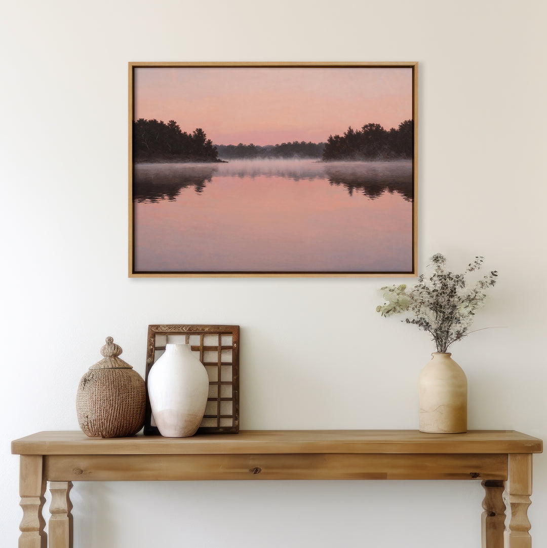 The Rose Lake Canvas Art decorates the space above a wooden table with neutral vases, a woven basket, dried flowers, and a rustic tray—perfect for minimalist bedroom decor on a light wall.