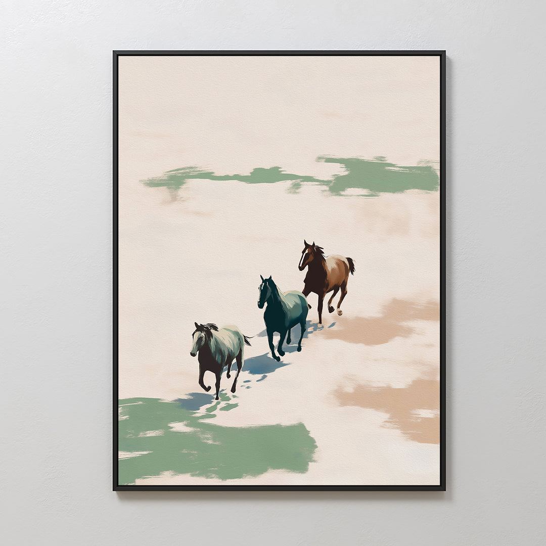 Running Free Canvas Art: Three horses run across an abstract sandy landscape with green and brown accents, bringing a touch of minimalism to any space when hung on a white wall.