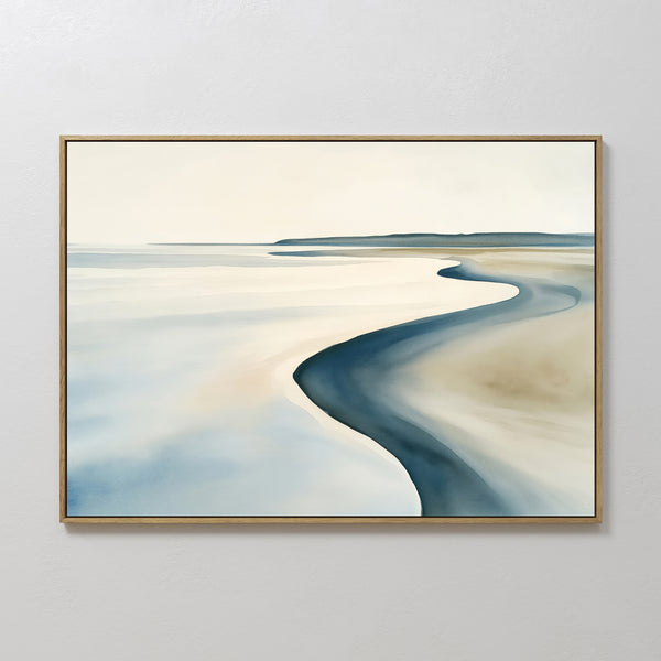 The Serene Coastline Canvas Art – Horizontal showcases a calm shoreline with soft beige and blue curves in a slim gold frame, set against a light gray wall—ideal for modern home decor.