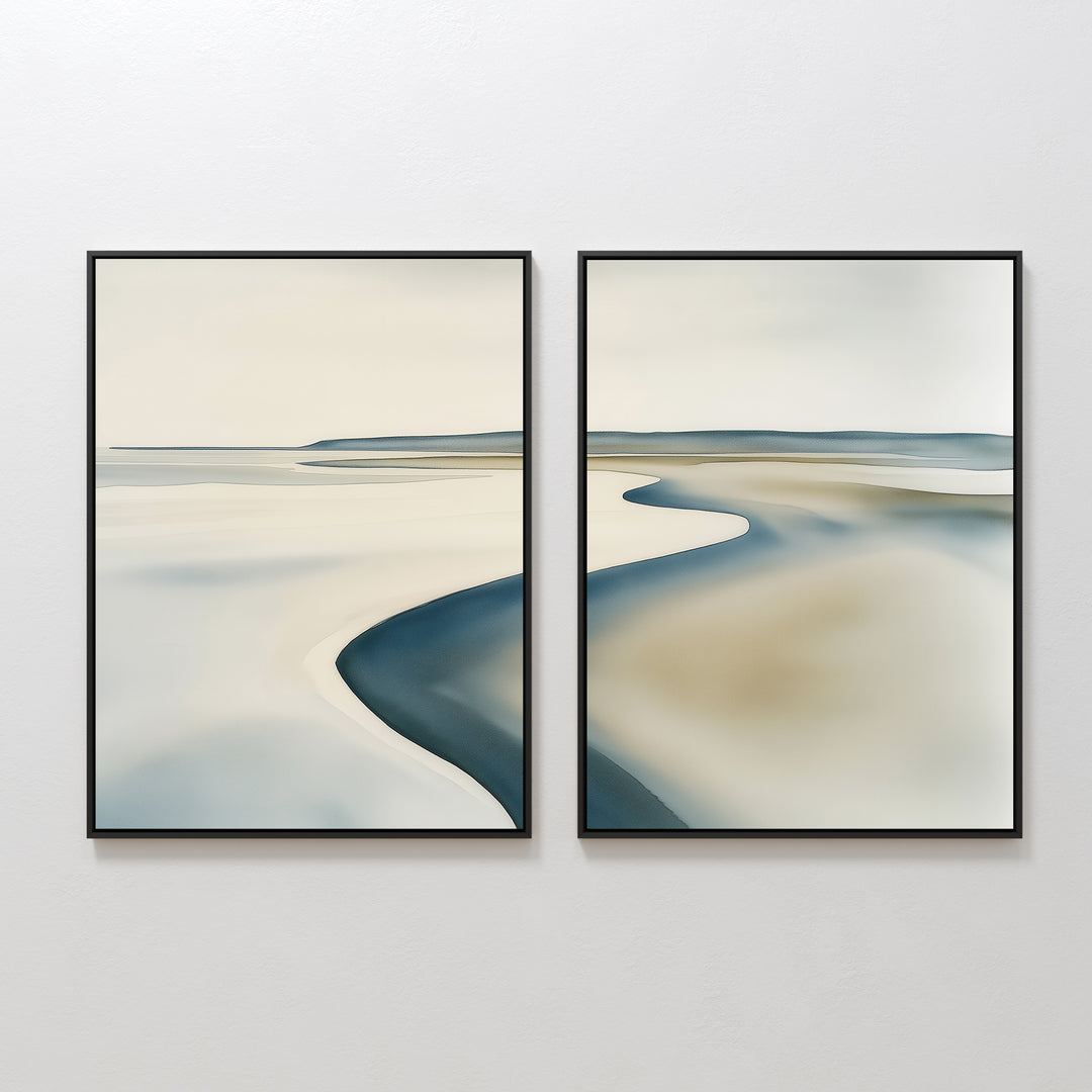 The Serene Coastline Set of 2 features framed abstract paintings of a shoreline in soft beige, blue, and gray tones. Their smooth, blurred lines offer minimalist, Nordic Park-inspired coastal wall art for modern spaces.
