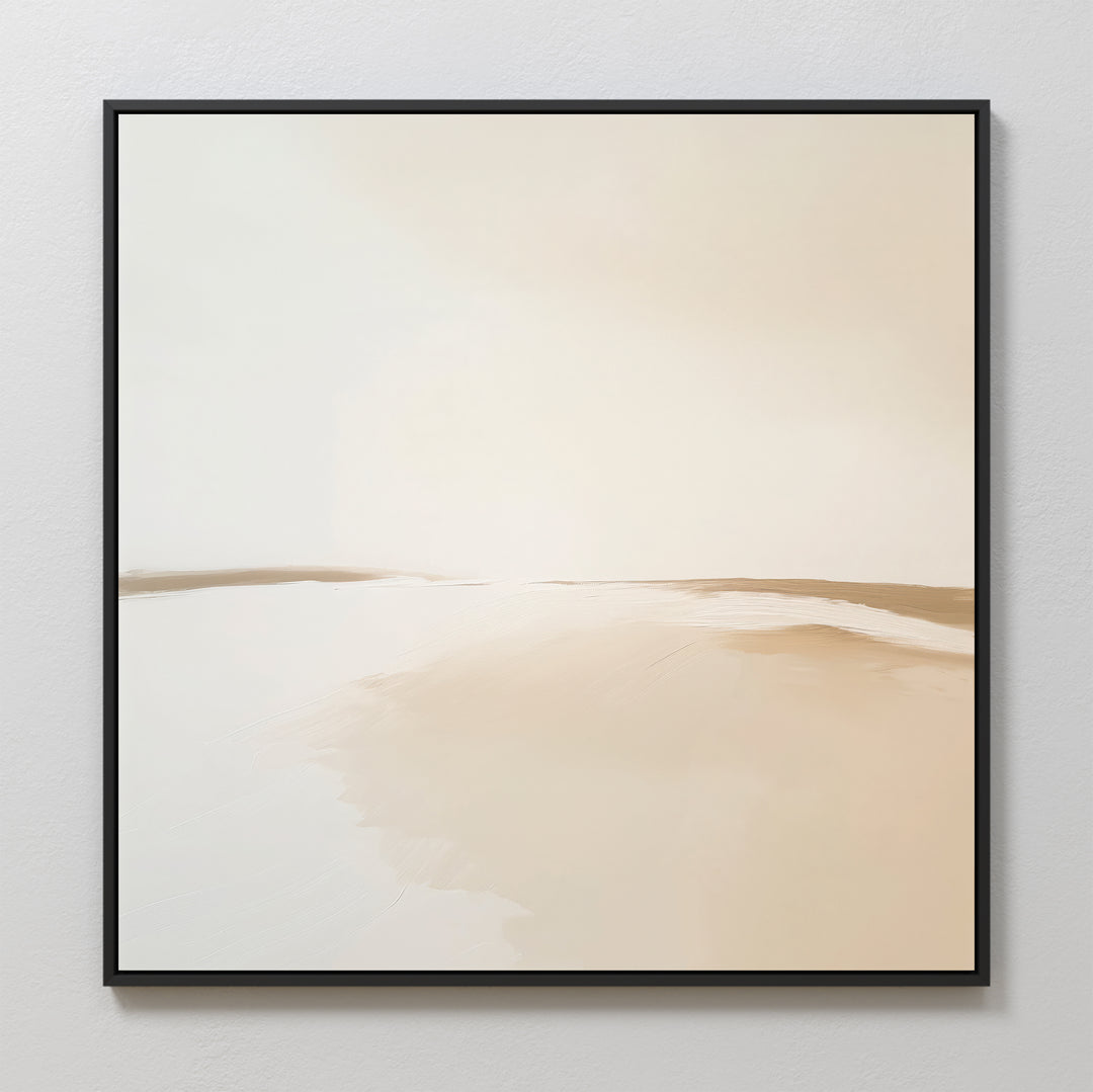 The Serene Expanse Abstract Canvas Art features minimalist wall art in neutral beige and cream tones with soft gradients, framed in black and displayed on a light wall—ideal modern decor for your living room.