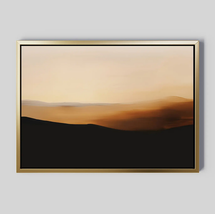 Sienna Ridge Canvas Art features a framed abstract landscape in soft gold, brown, and black tones, evoking a sunrise or sunset over rolling hills—ideal minimalist wall art for modern living room decor.
