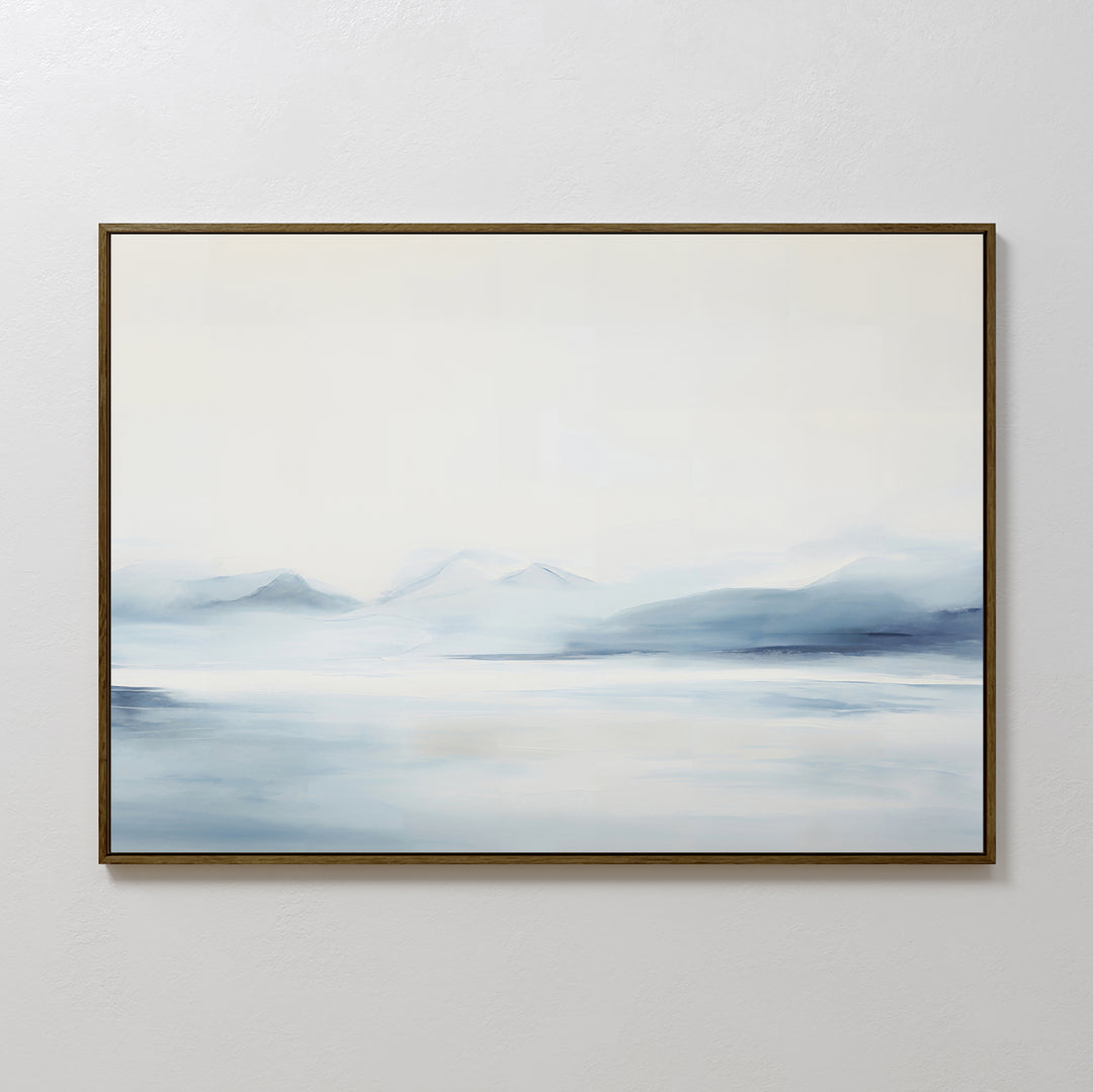 Silent Glaciers Canvas Art showcases misty blue mountains and a calm lake in soft brushstrokes, set in a sleek dark frame—an ideal minimalist wall art piece to create tranquility in any space.