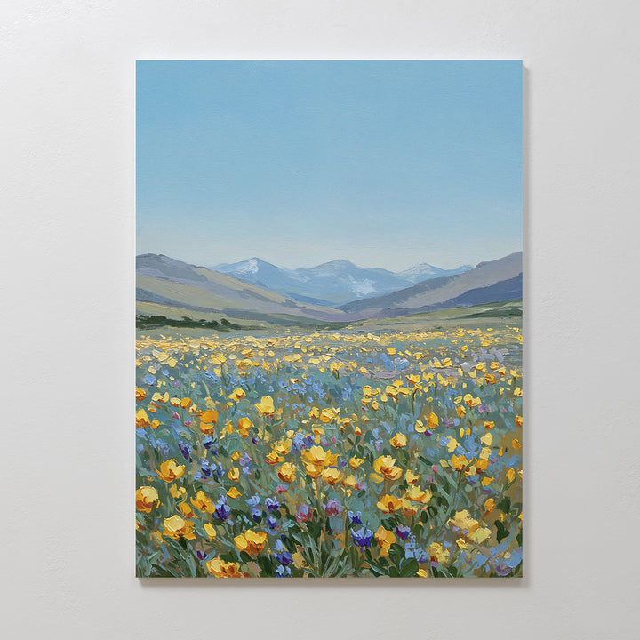 Skyview Field Canvas Art features a field of yellow and purple wildflowers beneath a clear blue sky with distant mountains—ideal minimalist wall art to brighten any bedroom decor.