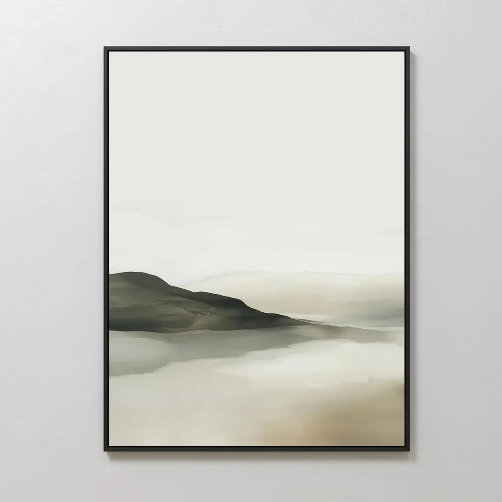 The Soft Valley Canvas Art – Vertical features a minimalist landscape with soft, muted tones of hazy hills and a reflective lake beneath an overcast sky. Framed in black, it’s ideal for adding subtle style to a light bedroom wall.