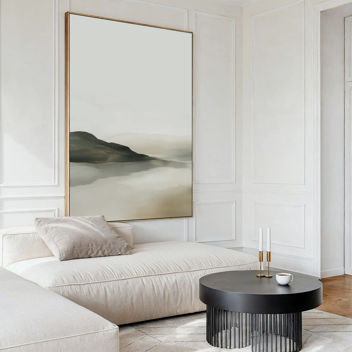 A modern living room with a cream-colored sectional, black round coffee table, and Soft Valley Canvas Art – Vertical. Minimalist decor and neutral tones create an elegant, timeless atmosphere.