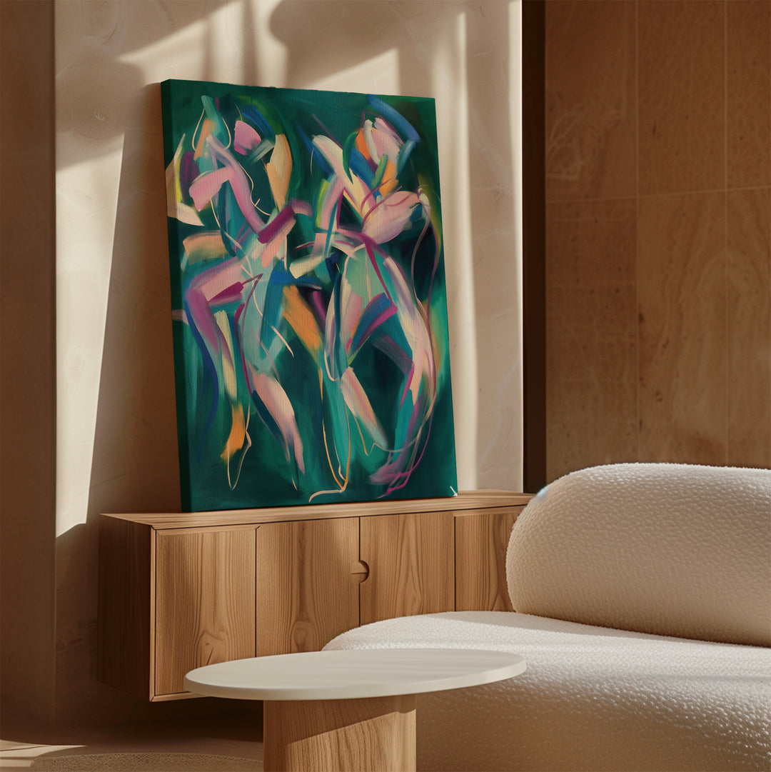 The Spiralling Forms Abstract Canvas Art, featuring colorful, dynamic brushstrokes, leans against a wooden cabinet in a sunlit modern room with beige walls, a textured white sofa, and a round white table.
