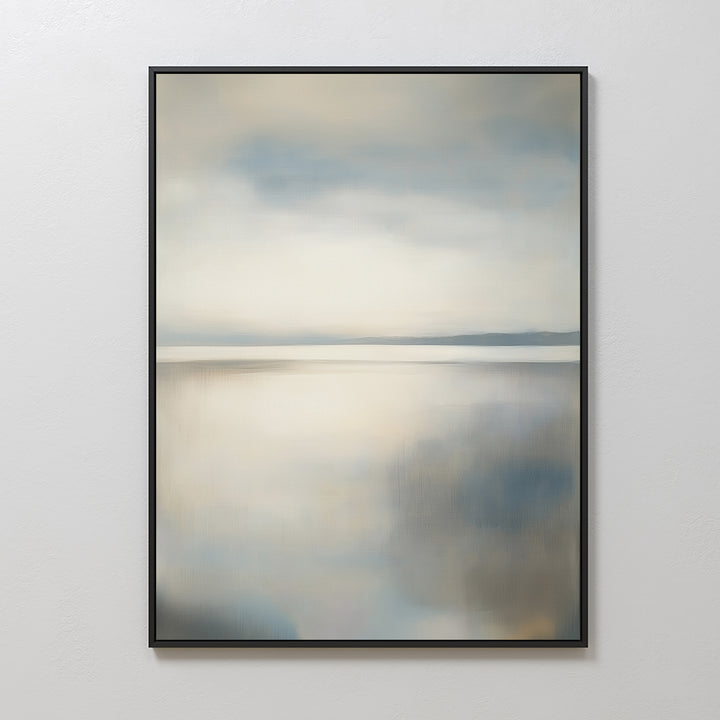 The Still Horizon Canvas Art features a framed abstract design with blended blue, beige, and white hues evoking a peaceful landscape. This minimalist wall art brings a calm, serene touch to any space.