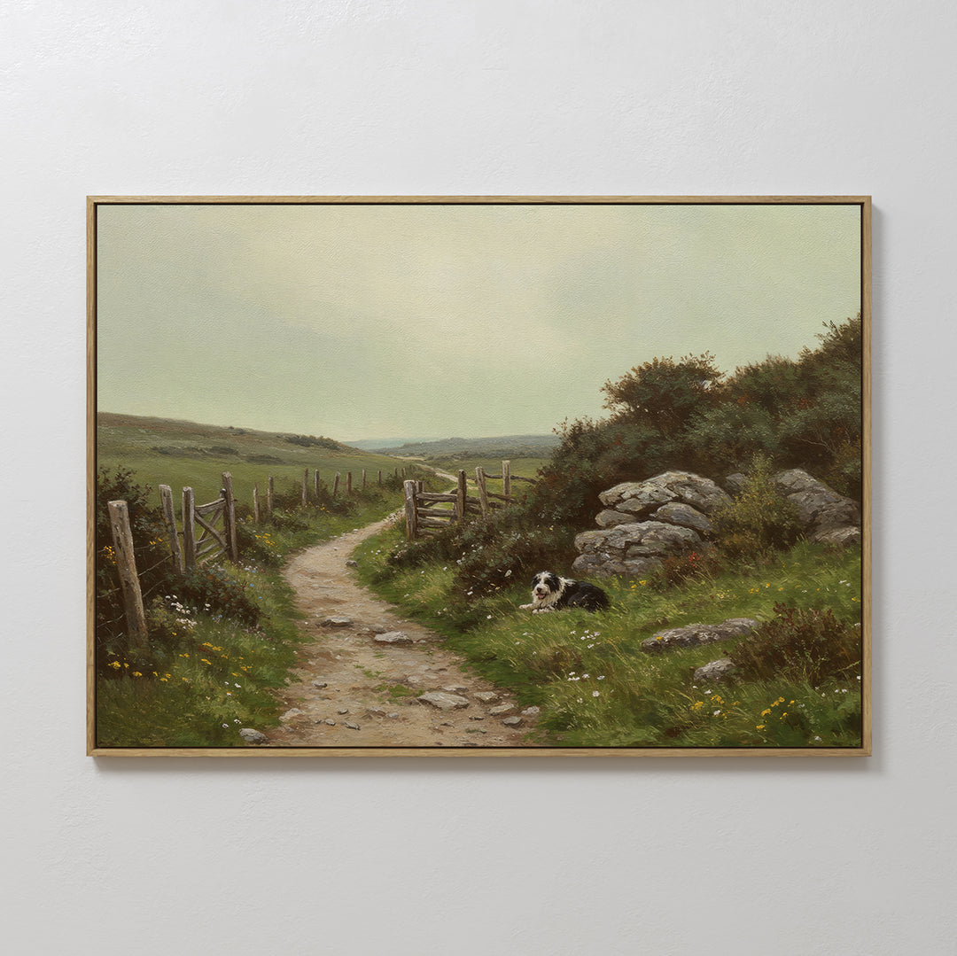 The Watchful Path Canvas Art features a rural landscape with a stone path, wooden fence, grassy hills, wildflowers, and a black and white dog—ideal countryside wall art for rustic living room decor.