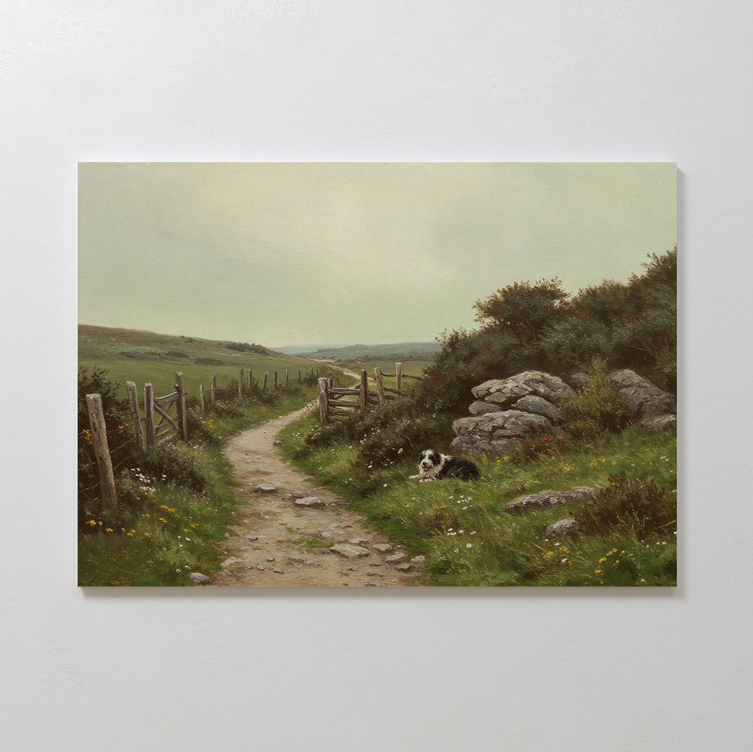 The Watchful Path Canvas Art depicts a rural dirt path bordered by a wooden fence, grassy fields, and wildflowers. A black and white dog rests near rocks under a cloudy sky—ideal countryside wall art for any space.