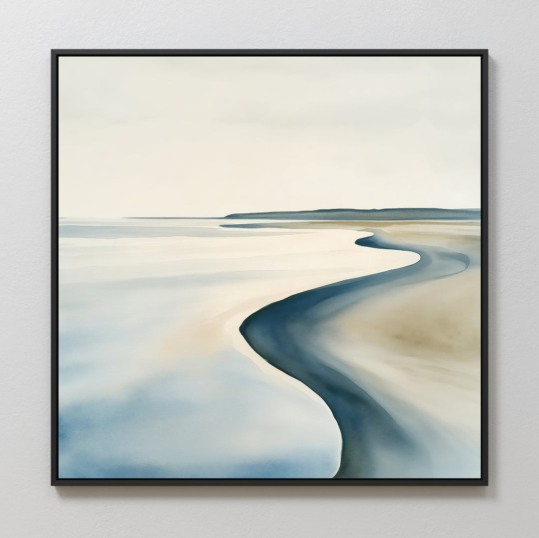The Serene Coastline Canvas Art features a winding shoreline, soft blue water, sandy beach, and distant hills under a pale sky, all in a black square frame—ideal minimalist decor for modern interiors.