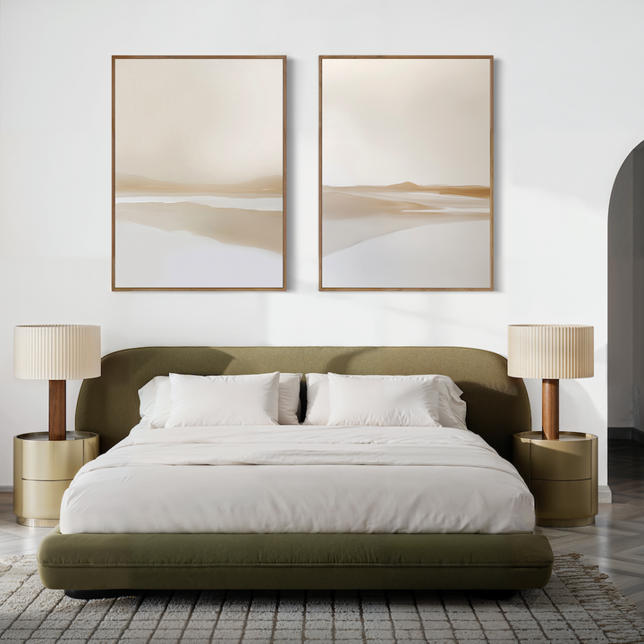 A modern bedroom with a green upholstered bed, white bedding, gold nightstands, textured rug, and the Tranquil Horizons Set of 2 abstract paintings above the bed creates a serene sanctuary—ideal for restful nights and stylish relaxation.