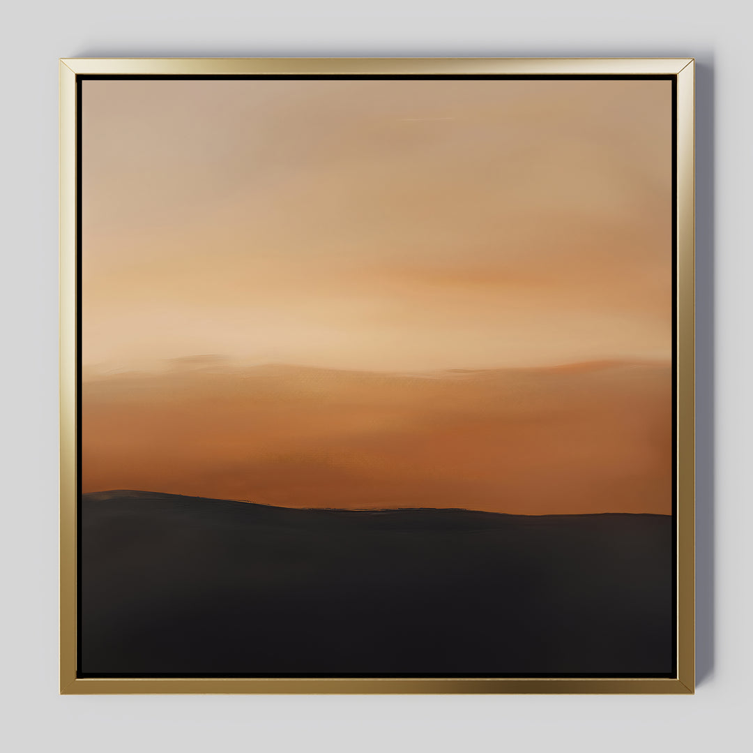 Tranquil Vista Abstract Canvas Art features a soft gradient sky in warm orange and beige over a dark silhouette, framed in sleek gold—an elegant, minimalist wall art piece ideal for bedroom or living room decor.