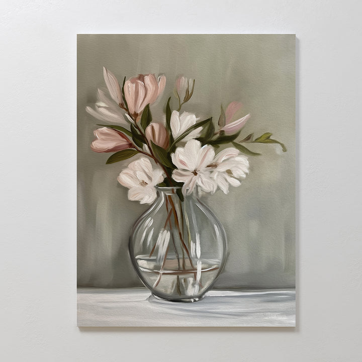 Vase & Grace Canvas Art features a clear glass vase with white and blush flowers on green stems, set against a muted gray-green background—ideal minimalist wall decor for your living room.