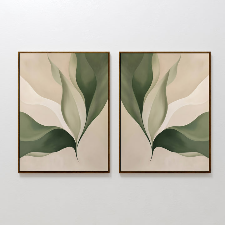 The Verdant Grace Set of 2 features framed abstract art with overlapping green and beige leaf shapes on a light backdrop—ideal minimalist wall decor to enhance your living room.