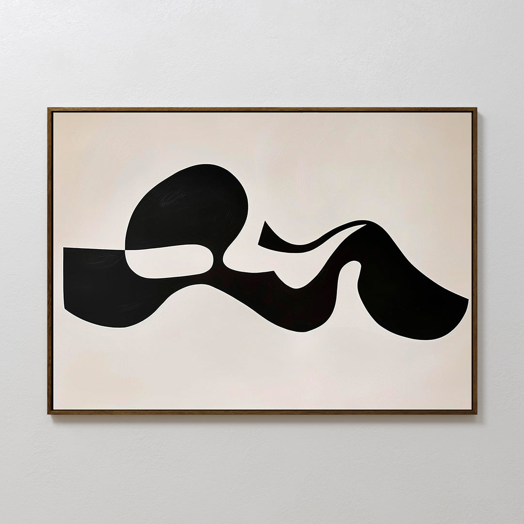 Fluid Forms Abstract Canvas Art features bold, irregular black shapes on a white background with a slim brown frame. This organic, minimalist piece adds striking modern style to any space—perfect for contemporary wall art décor.