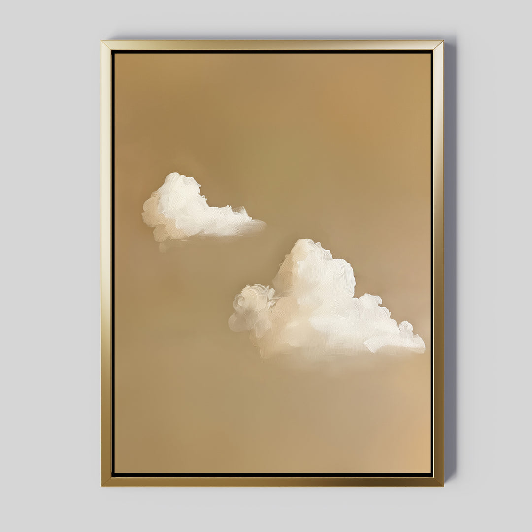 Whispering Clouds is a framed painting featuring two fluffy white clouds on a soft light brown background with a gold border. This minimalist wall art brings calming charm, ideal for living room or bedroom decor.