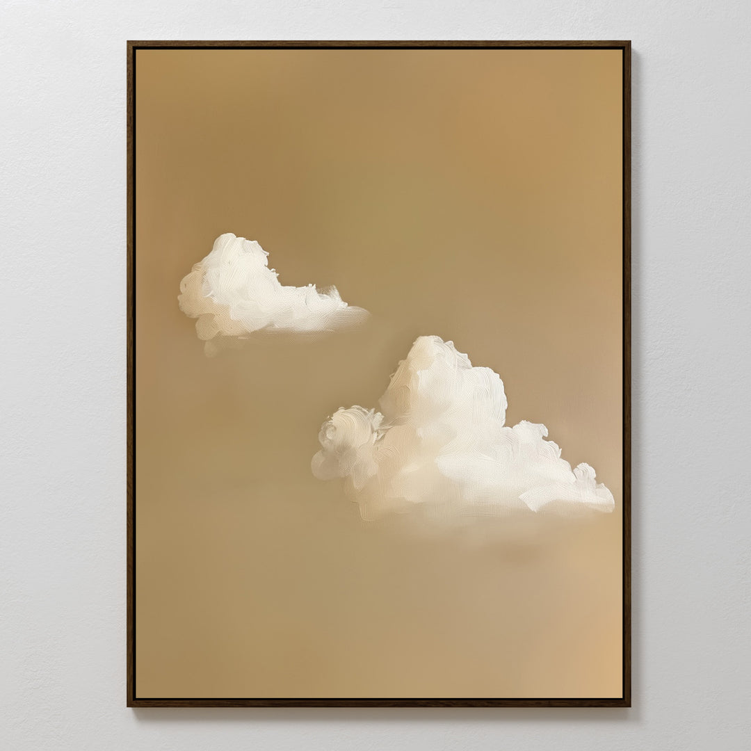 Whispering Clouds framed painting features two fluffy white clouds on a soft, light brown background—perfect minimalist wall art for bedroom or living room decor, shown displayed on a plain white wall.