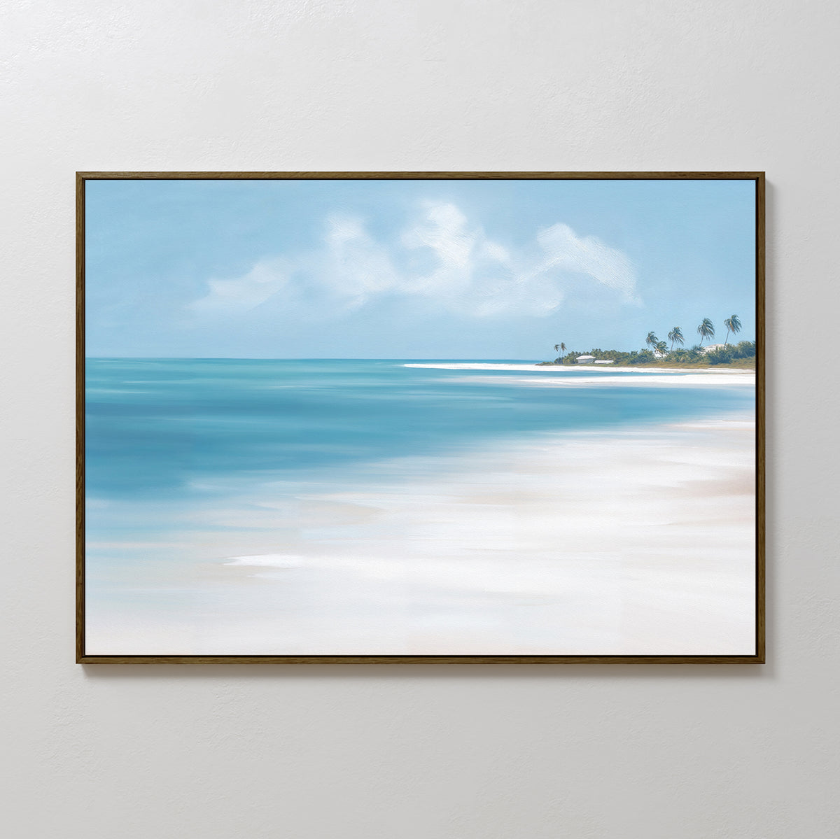 The Azure Tranquility Canvas Art - Horizontal features a serene beach scene with turquoise waters, soft white sand, and distant palm trees beneath a partly cloudy sky, displayed in a stylish frame on a plain white wall.