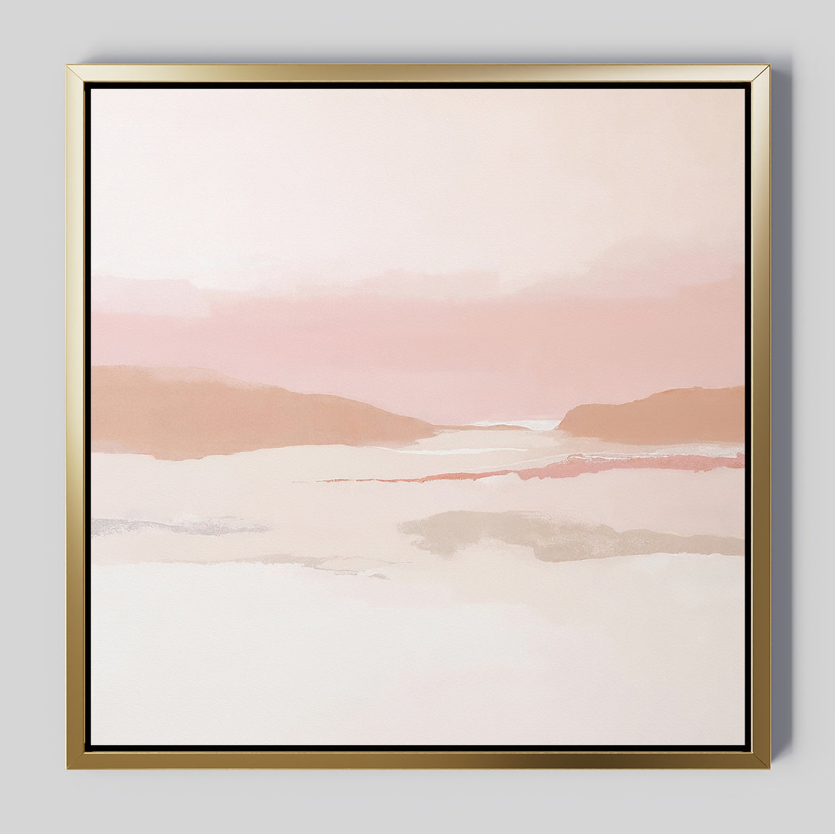The Blush Mesa Canvas Art - Square features a minimalist abstract landscape in soft pink and beige earth tones with gentle hills and a hazy sky, set in a gold frame against a light gray background.