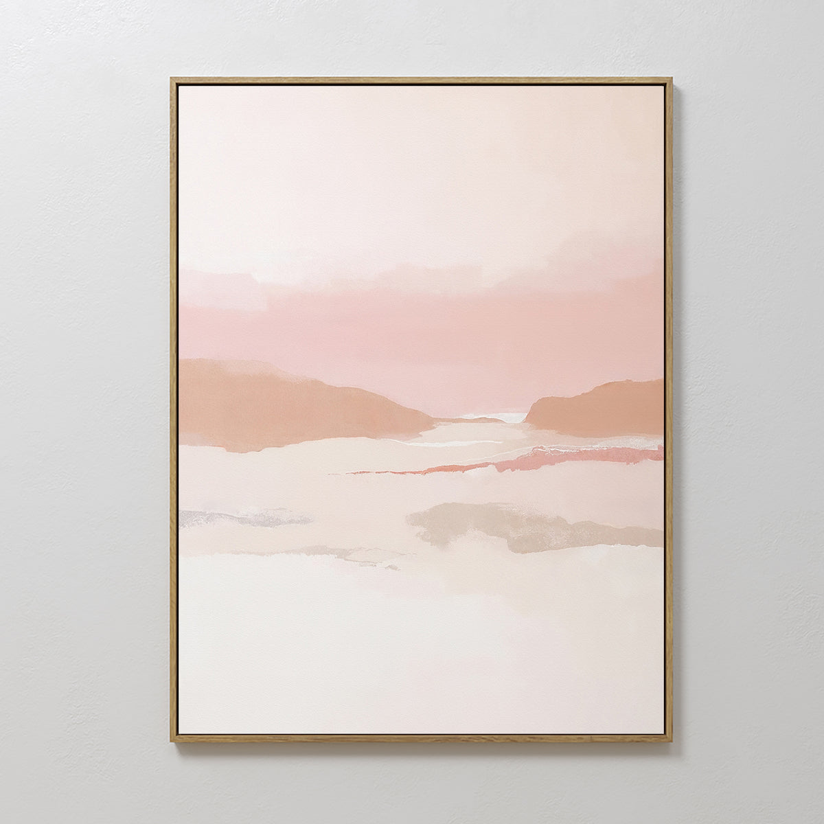 The Blush Mesa Canvas Art - Vertical features soft, blended shades of pink, white, and beige for a serene abstract look. This minimalist wall art in gentle earth tones is displayed on a light gray wall.