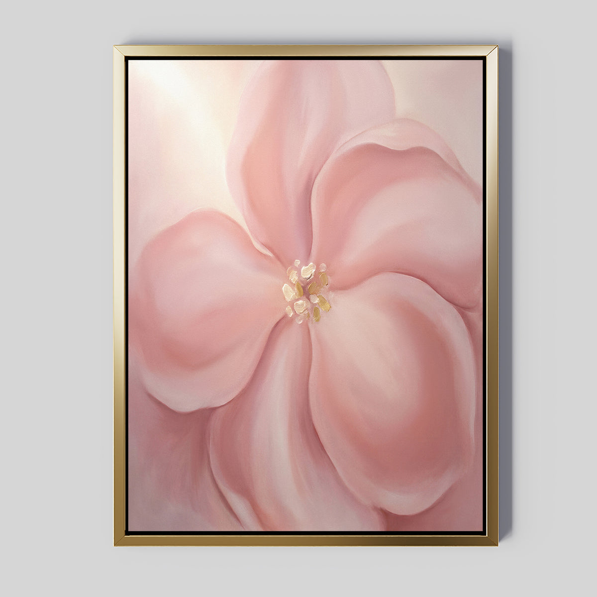 Blushing Magnolia Canvas Art - Vertical showcases a soft pink magnolia with five large petals and a creamy center, framed in gold against a light gray background—ideal for adding romantic charm to any wall.