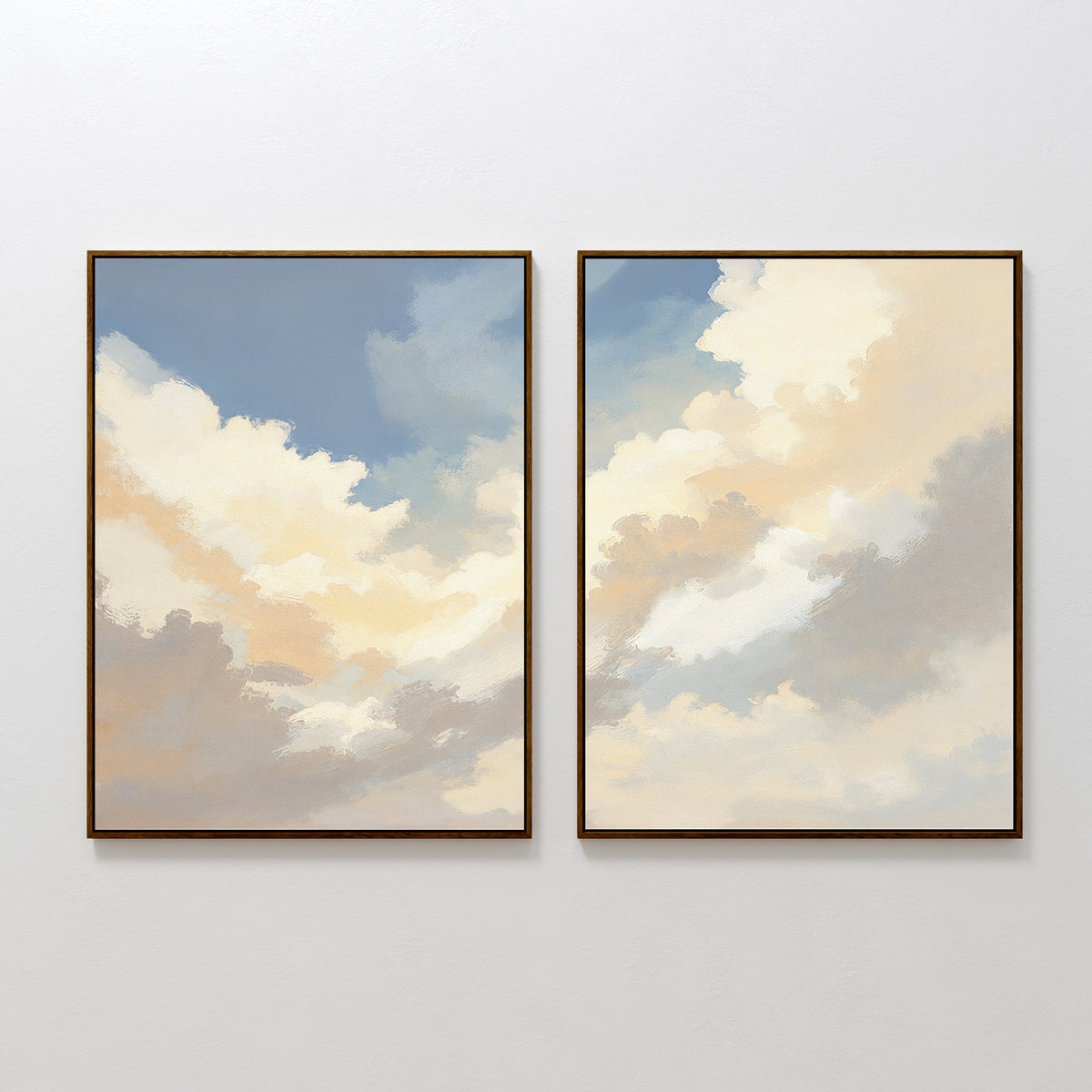Celestial Embrace – Set of 2 features framed canvas prints with soft clouds in blue and warm skies, creating peaceful cloud wall art and an airy Nordic Park vibe on any white wall.