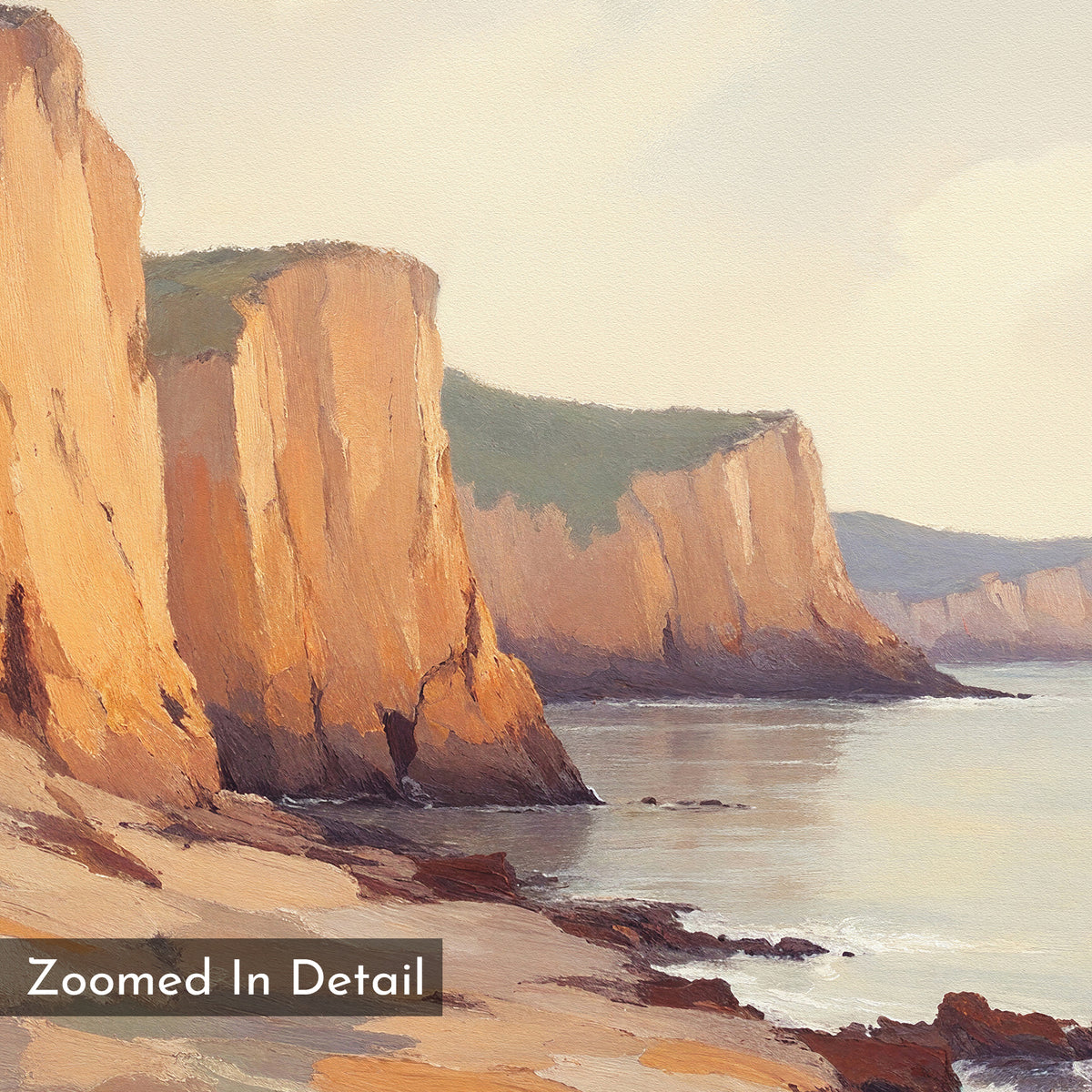The Coastal Grandeur Canvas Art - Horizontal shows tall, green-topped cliffs above a calm sea with sunlight on the rocks. Gentle waves touch the shore below. "Zoomed In Detail" is written in the lower left corner of this coastal print.