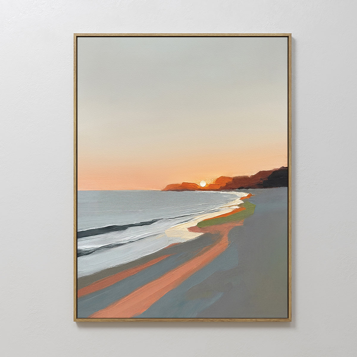 Add tranquil charm to your space with the Coastal Reverie Canvas Art - Vertical, featuring a framed print of a sunset beach with gentle waves and vivid orange skies behind cliffs—ideal for serene home decor.