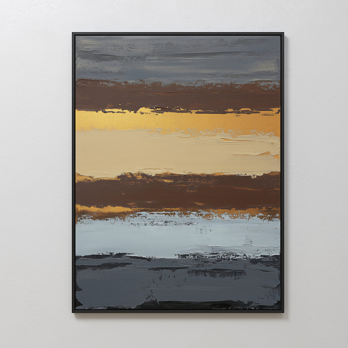 The Coastal Strata Canvas Art - Vertical features abstract bands of gray, brown, gold, beige, and blue with textured brushstrokes. Metallic gold accents add sophistication, and the contemporary print is elegantly framed in black.