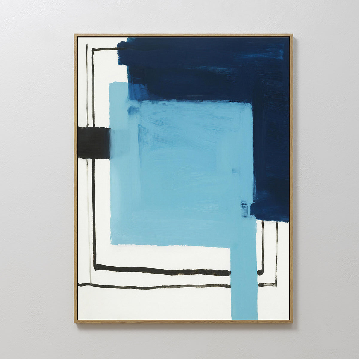The Cobalt Intersection Canvas Art - Vertical features overlapping blue and black geometric shapes on a white background, with bold brushstrokes and thin lines, framed in a simple wooden frame for modern decor.