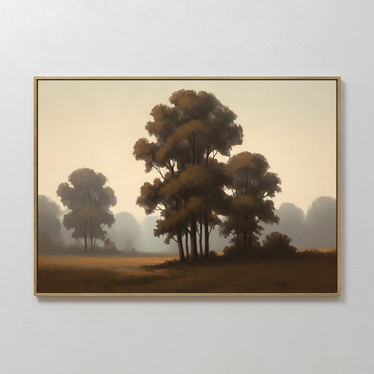 The Dawn Silhouettes Canvas Art - Horizontal displays tall, leafy trees in gentle morning light with a misty Nordic Park backdrop, elegantly framed and mounted on a plain light-colored wall.