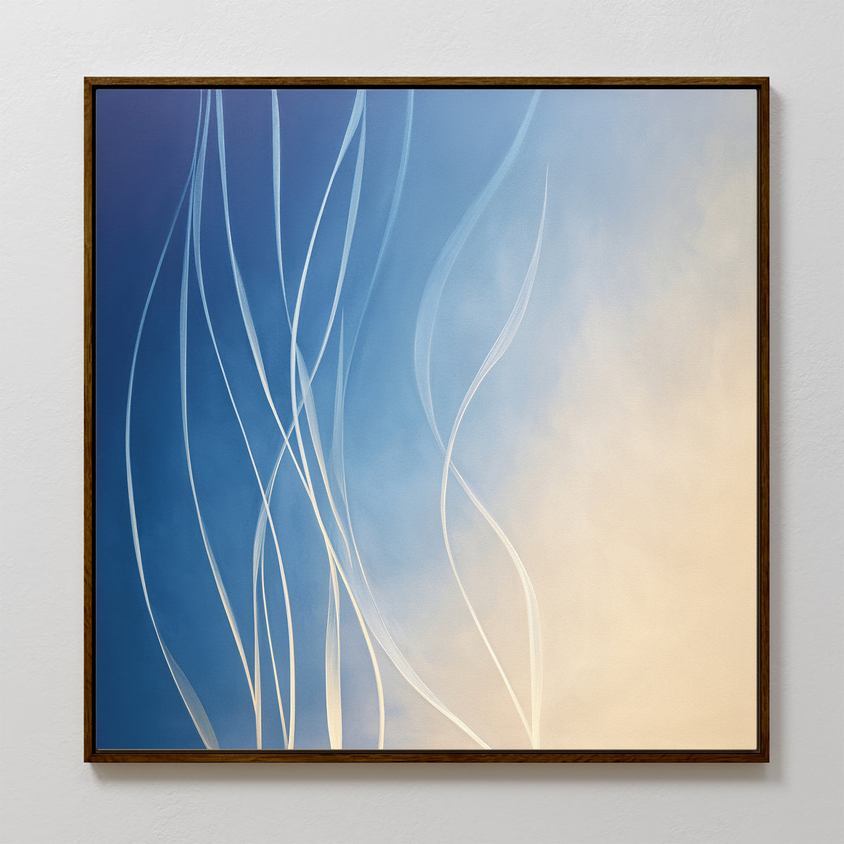 Ethereal Lines Canvas Art - Square features flowing white lines on a gradient from deep blue to soft beige, framed in dark wood and mounted on a light wall—a striking, modern print perfect for contemporary living room decor.
