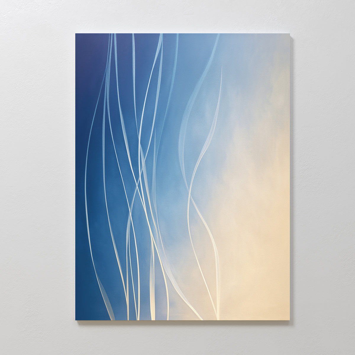 Ethereal Lines Canvas Art - Vertical features a gradient from deep blue to soft cream with flowing white curves, making it a perfect abstract print for modern living rooms or Nordic Park-inspired interiors.