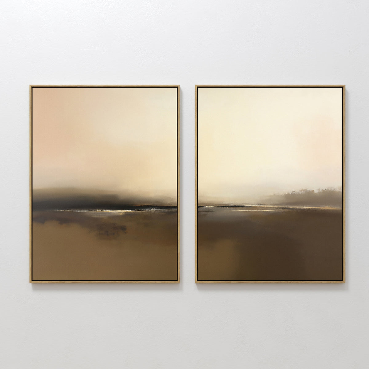 The Foggy Beach Expanse - Set Of 2 features framed abstract art in soft earth tones of brown, beige, and cream. Each piece has a hazy horizon for an ethereal, tranquil look, displayed side by side on a white wall.