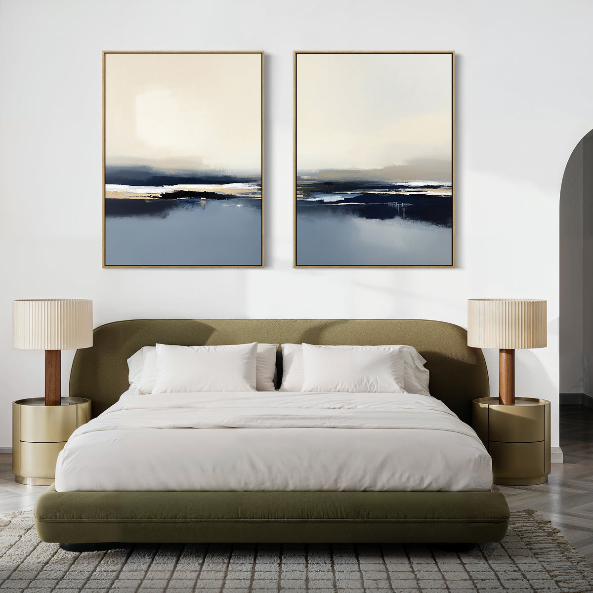 A modern bedroom featuring the Frozen Bay - Set Of 2 above a green upholstered bed with white bedding, two round nightstands with beige lamps, a gray rug, and striking abstract winter waters artwork as contemporary prints.
