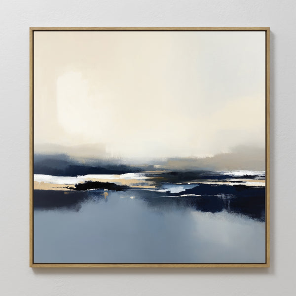 Frozen Bay Canvas Art - Square features soft, blended blue, white, beige, and dark gray tones that evoke winter waters. Framed in light wood and displayed on a white wall, it's ideal as a contemporary print for modern living rooms.