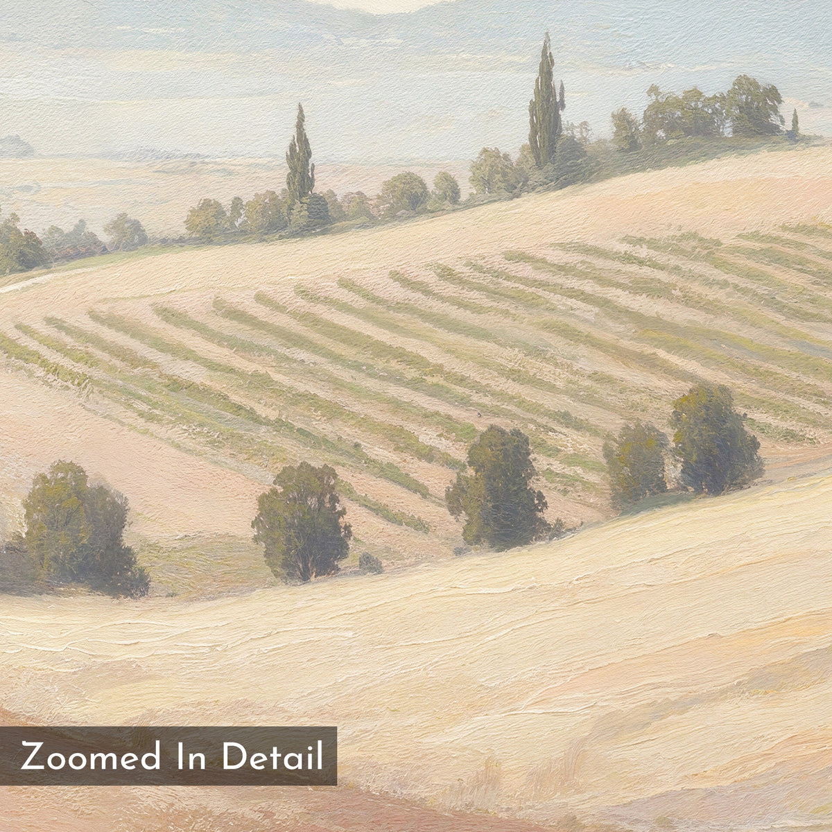 A close-up of the Harvest Fields Canvas Art - Square shows rolling golden fields, scattered trees, a hazy sky, and two tall cypress trees in the background. Text on image: Zoomed In Detail.