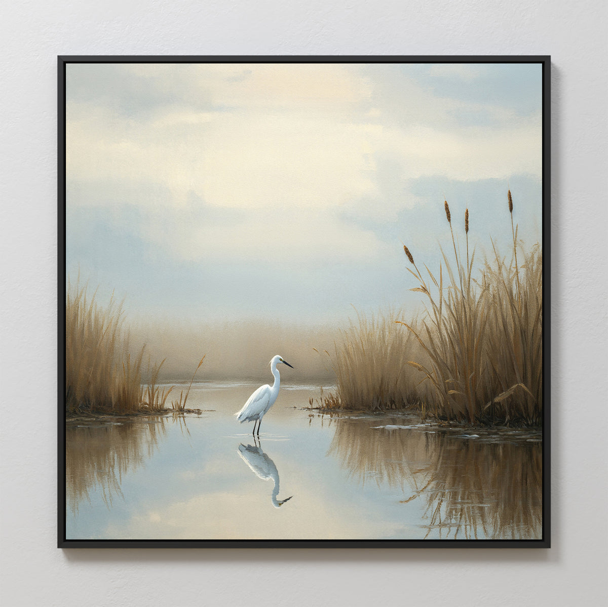 Heron's Morning Canvas Art - Square: A framed print depicting a white egret in calm water among brown reeds and cattails, its reflection below a soft, cloudy sky—a tranquil wetland scene.